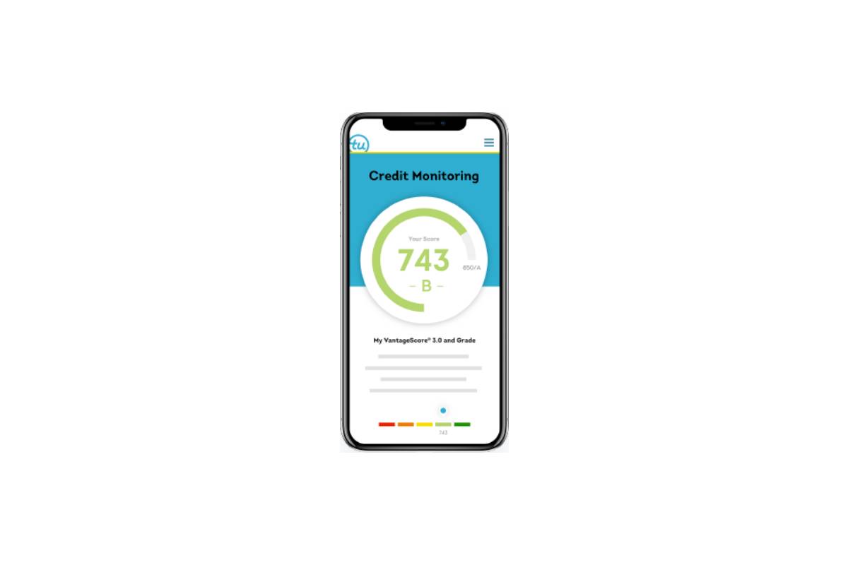 A smartphone display shows a credit monitoring app with a score of 743 and a grade of B, featured in a circular progress indicator. 